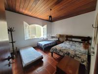 Casa com 4 Dormitórios
